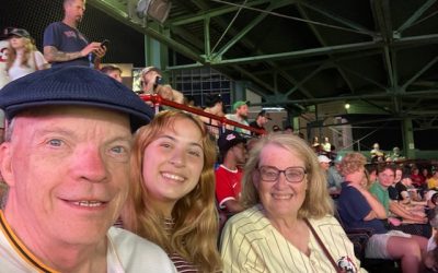 Hermandad goes out to the ballgame with a past scholarship recipient.