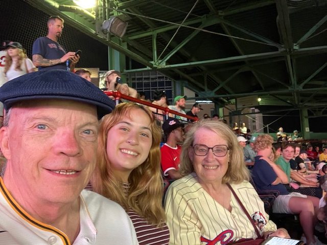 Hermandad goes out to the ballgame with a past scholarship recipient.