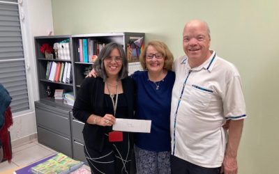 Hermandad presents their latest gift of $1,000 to Corporación Milagros del Amor (CorMA) in Caguas, Puerto Rico on Wednesday, December 10, 2025.