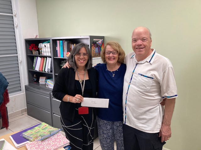 Hermandad presents their latest gift of $1,000 to Corporación Milagros del Amor (CorMA) in Caguas, Puerto Rico on Wednesday, December 10, 2025.